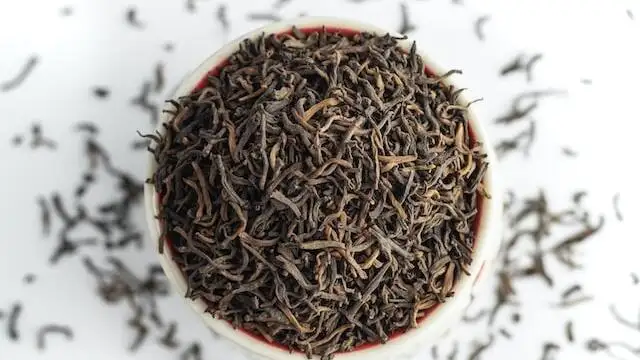 black tea leaves isolated on white background