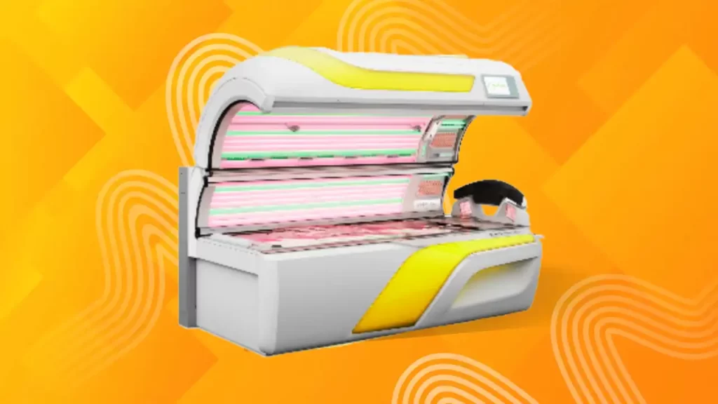 This image is of a tanning bed with a yellow and orange background. The bed has white and yellow parts, as well as a yellow stripe running across it.
